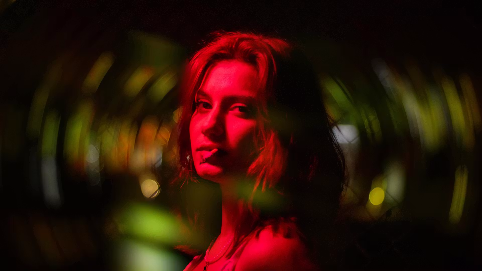 abstract image of a woman light by red light